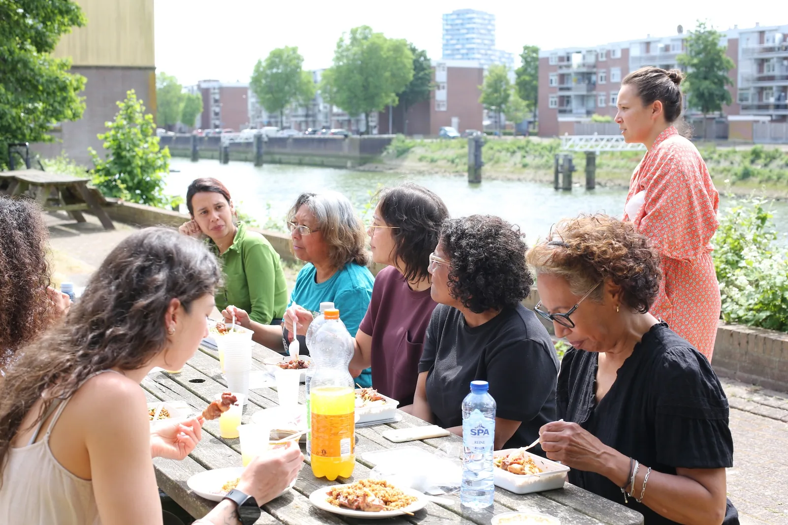 People sharing a meal during a Museum Maluku gathering